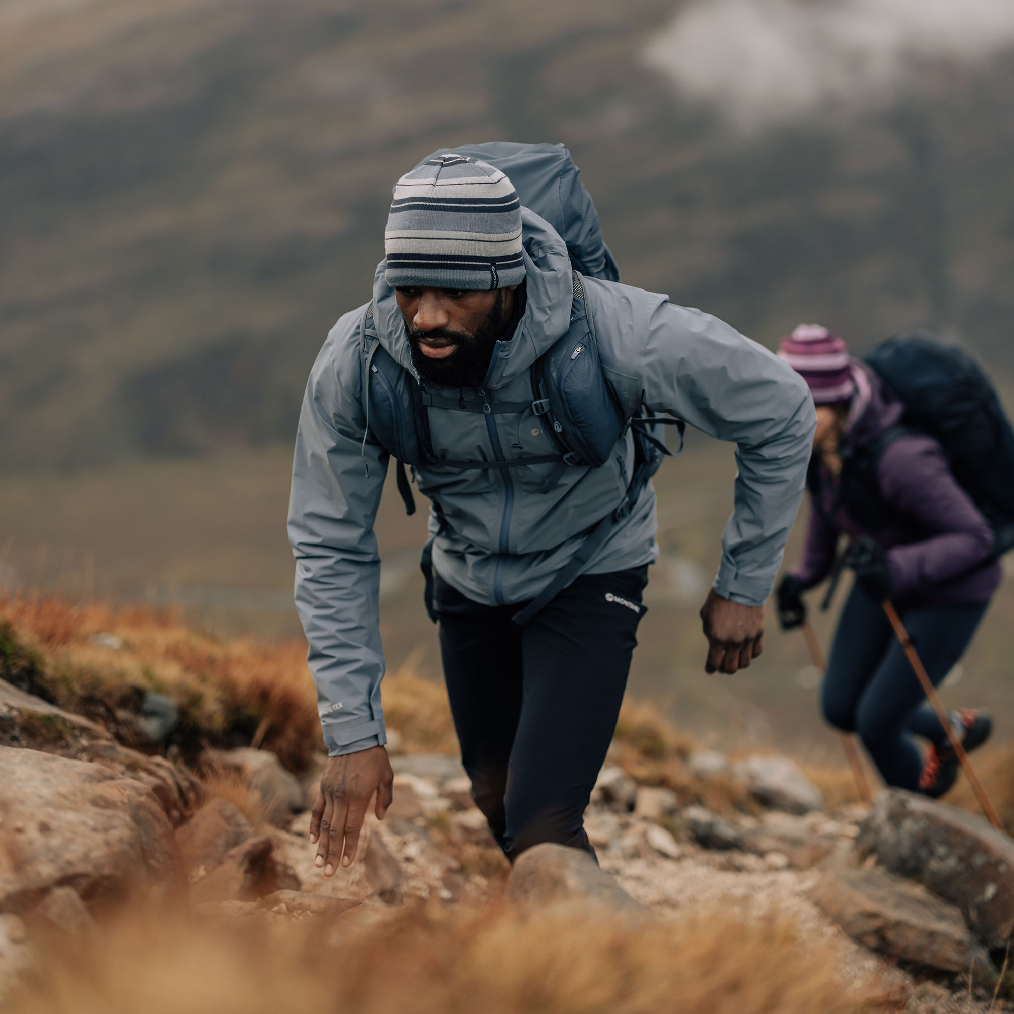 Stone Blue Montane Men's Phase Lite Waterproof Jacket Campaign Image